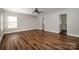 Large bedroom features hardwood floors, neutral walls, and two closets at 124 Glade Valley Ave, Mooresville, NC 28117