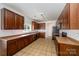 Well-equipped kitchen featuring granite countertops and stainless steel appliances at 124 Glade Valley Ave, Mooresville, NC 28117