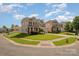 Two-story homes on a cul-de-sac, showcasing well-maintained lawns at 124 Glade Valley Ave, Mooresville, NC 28117