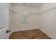 Walk-in closet features shelving for storage at 124 Glade Valley Ave, Mooresville, NC 28117