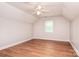 Empty bedroom with wood floor, neutral paint, and a window at 14232 Kendalton Meadow Dr, Mint Hill, NC 28227
