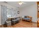 Bright dining room featuring natural light, hardwood floors, a bench table, and contemporary decor at 1610 Union Rd # 1610B, Gastonia, NC 28054