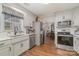 Bright kitchen features stainless steel appliances, ample cabinet space, and a view to the dining area at 1610 Union Rd # 1610B, Gastonia, NC 28054