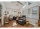 Bright living area with large windows, a vaulted ceiling, hardwood floors, and comfortable seating at 1610 Union Rd # 1610B, Gastonia, NC 28054