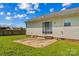 Backyard featuring a concrete patio accessible via the sliding door at 189 Lochshire Ln, Woodleaf, NC 27054