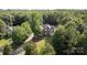 Aerial view showing the property surrounded by lush forest and neighborhood at 2019 Lynmore Dr, Sherrills Ford, NC 28673