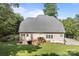 Expansive backyard view featuring a patio with outdoor furniture and well-maintained lawn at 2019 Lynmore Dr, Sherrills Ford, NC 28673