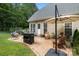 Backyard featuring a patio area, grill, outdoor furniture, and green grass at 2019 Lynmore Dr, Sherrills Ford, NC 28673
