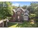 This traditional brick home is surrounded by mature trees at 2019 Lynmore Dr, Sherrills Ford, NC 28673
