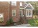 Brick home with well-kept landscape, featuring a welcoming front entrance and a brick staircase at 2019 Lynmore Dr, Sherrills Ford, NC 28673