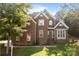 Charming brick home with a well-manicured lawn and inviting entrance perfect for a Gathering at 2019 Lynmore Dr, Sherrills Ford, NC 28673