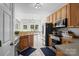 Open kitchen with stainless steel appliances, tile flooring, and breakfast area at 2019 Lynmore Dr, Sherrills Ford, NC 28673