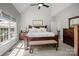 Sun-filled main bedroom with large bed, bench, and spacious layout at 2019 Lynmore Dr, Sherrills Ford, NC 28673
