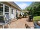 Cozy patio area featuring chairs, tables, grill and outdoor decor at 2019 Lynmore Dr, Sherrills Ford, NC 28673