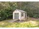 Charming shed in wooded backyard features ramp access and ample storage at 2019 Lynmore Dr, Sherrills Ford, NC 28673