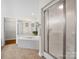 Bright bathroom with a tub, shower, and spacious closet for storage and a relaxing, spa-like experience at 2872 Wheat Field Ct, Lincolnton, NC 28092