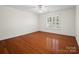 Offers hardwood flooring and natural lighting, complete with a ceiling fan to provide additional comfort and air circulation at 2872 Wheat Field Ct, Lincolnton, NC 28092
