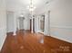 Formal dining room showcasing hardwood floors, columns, and plenty of natural light at 2872 Wheat Field Ct, Lincolnton, NC 28092