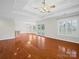 Spacious living area with hardwood floors and tray ceilings offers plenty of natural light at 2872 Wheat Field Ct, Lincolnton, NC 28092