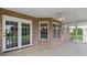 The covered brick patio is accessible through French doors at 2872 Wheat Field Ct, Lincolnton, NC 28092