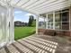 Covered patio looking out into a lush lawn at 2872 Wheat Field Ct, Lincolnton, NC 28092