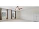 Bright bedroom with white walls, carpeted floors, and natural light from two windows at 3043 Streamlet Way, Monroe, NC 28110