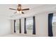 Large main bedroom with tray ceiling, ceiling fan, and lots of natural light at 3043 Streamlet Way, Monroe, NC 28110