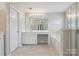 Bright bathroom featuring a vanity area, soaking tub and enclosed shower at 3043 Streamlet Way, Monroe, NC 28110