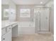 Bright main bathroom with soaking tub and glass enclosed shower at 3043 Streamlet Way, Monroe, NC 28110