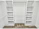 Organized walk-in closet with custom shelving providing plenty of space for storage and organization at 323 Keswick Ave, Charlotte, NC 28206