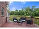Charming deck with outdoor seating offering a relaxing spot to enjoy the beautiful backyard at 3451 Greene Rd, Monroe, NC 28110