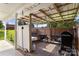 Functional outdoor kitchen with multiple grills, perfect for entertaining guests at 3451 Greene Rd, Monroe, NC 28110