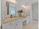 Bright bathroom featuring double sink vanity with granite counters and decorative mirrors at 347 Bayberry Creek Cir, Mooresville, NC 28117