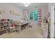 bedroom featuring a canopy bed, bookshelf, and decorative wall art at 347 Bayberry Creek Cir, Mooresville, NC 28117