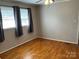 Bright bedroom with hardwood floors and ample natural light at 356 Lucky Hollow Rd, Hickory, NC 28601