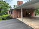 Attached carport with a concrete floor and convenient access to the home at 356 Lucky Hollow Rd, Hickory, NC 28601