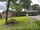 Charming brick home featuring a carport and well-maintained front yard at 356 Lucky Hollow Rd, Hickory, NC 28601