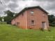 Brick home with a carport and a sliding glass door at 356 Lucky Hollow Rd, Hickory, NC 28601