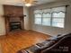 Inviting living room with a brick fireplace and comfortable seating at 356 Lucky Hollow Rd, Hickory, NC 28601