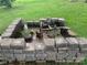Unique garden fountain surrounded by lush greenery at 356 Lucky Hollow Rd, Hickory, NC 28601