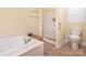 The bathroom features a tub, shower, tile flooring, and separate toilet at 3697 Travertine Dr, Lancaster, SC 29720