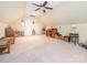 This bonus room is open and spacious with a ceiling fan and lots of vintage furniture at 3697 Travertine Dr, Lancaster, SC 29720