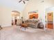 Spacious living room with neutral tones, ample seating, and access to kitchen at 3697 Travertine Dr, Lancaster, SC 29720