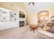 Cozy living room with built-in shelving, fireplace, and comfortable seating, perfect for relaxing at 3697 Travertine Dr, Lancaster, SC 29720