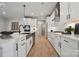 Modern kitchen with stainless steel appliances, quartz countertops, and ample cabinet space at 416 Balboa St, Matthews, NC 28104