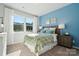 Serene bedroom with a large window, soft carpet, and a comfortable bed with stylish bedding at 420 Balboa St, Matthews, NC 28104