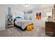 Vibrant ' bedroom with a playful design, featuring colorful accents and ample natural light at 420 Balboa St, Matthews, NC 28104