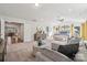 Bright main bedroom featuring a vaulted ceiling, neutral colors, and an adjoining sitting area at 420 Balboa St, Matthews, NC 28104