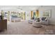 Expansive main bedroom suite with a sitting area, abundant natural light, and neutral decor at 420 Balboa St, Matthews, NC 28104