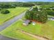 An aerial view of the property, showing the house layout, outdoor space, and surrounding neighborhood at 522 Ne Connector Hwy, Albemarle, NC 28001